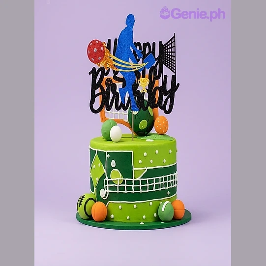 Sports Glitter Birthday Cake Green single tier sports themed cake with basketball player and soccer ball toppers