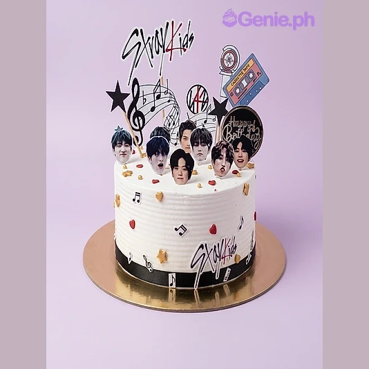 Stray Kids White Birthday Cake White 1-tier birthday cake with Stray Kids band member photo toppers and musical note decorations