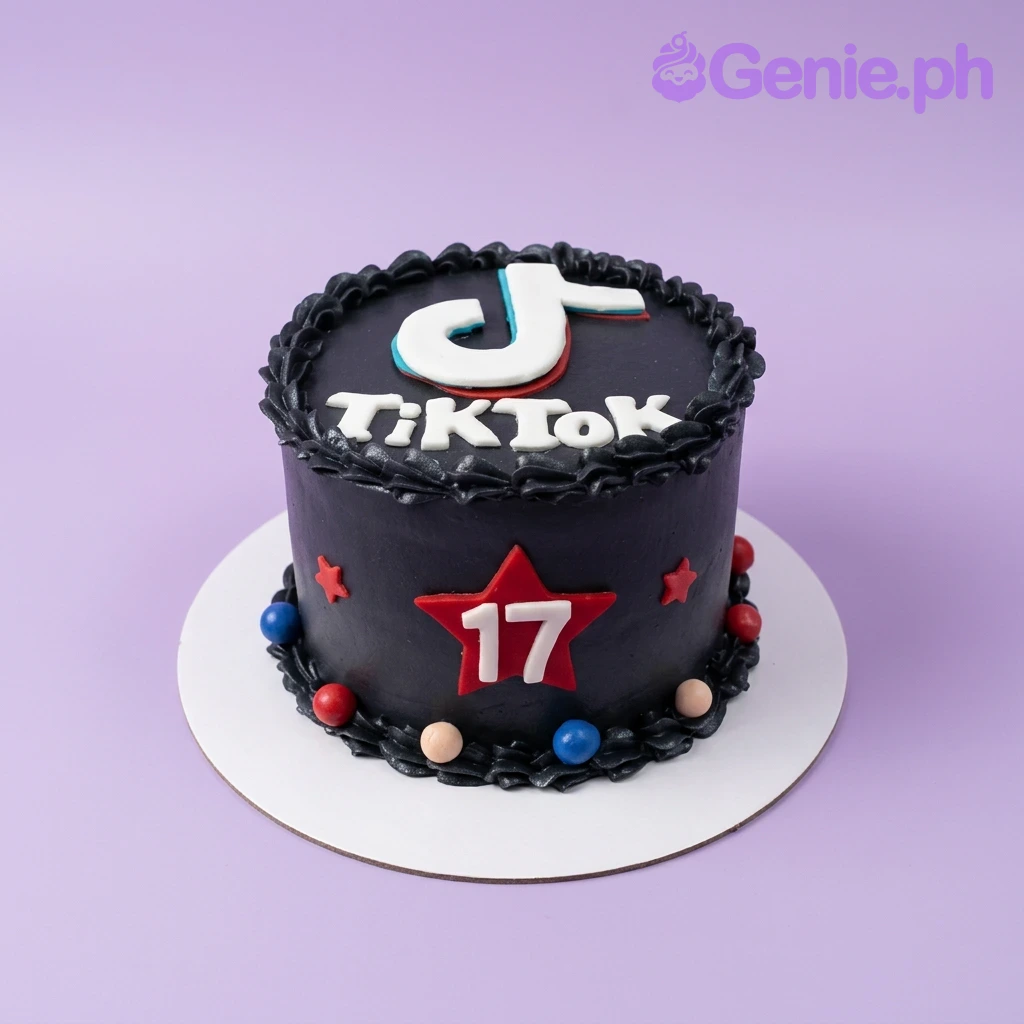 TikTok Black Birthday Cake A black, white, red, blue, and tan 1 Tier cake themed around TikTok, featuring a TikTok logo, the number 17 on a red star, and colorful spheres.