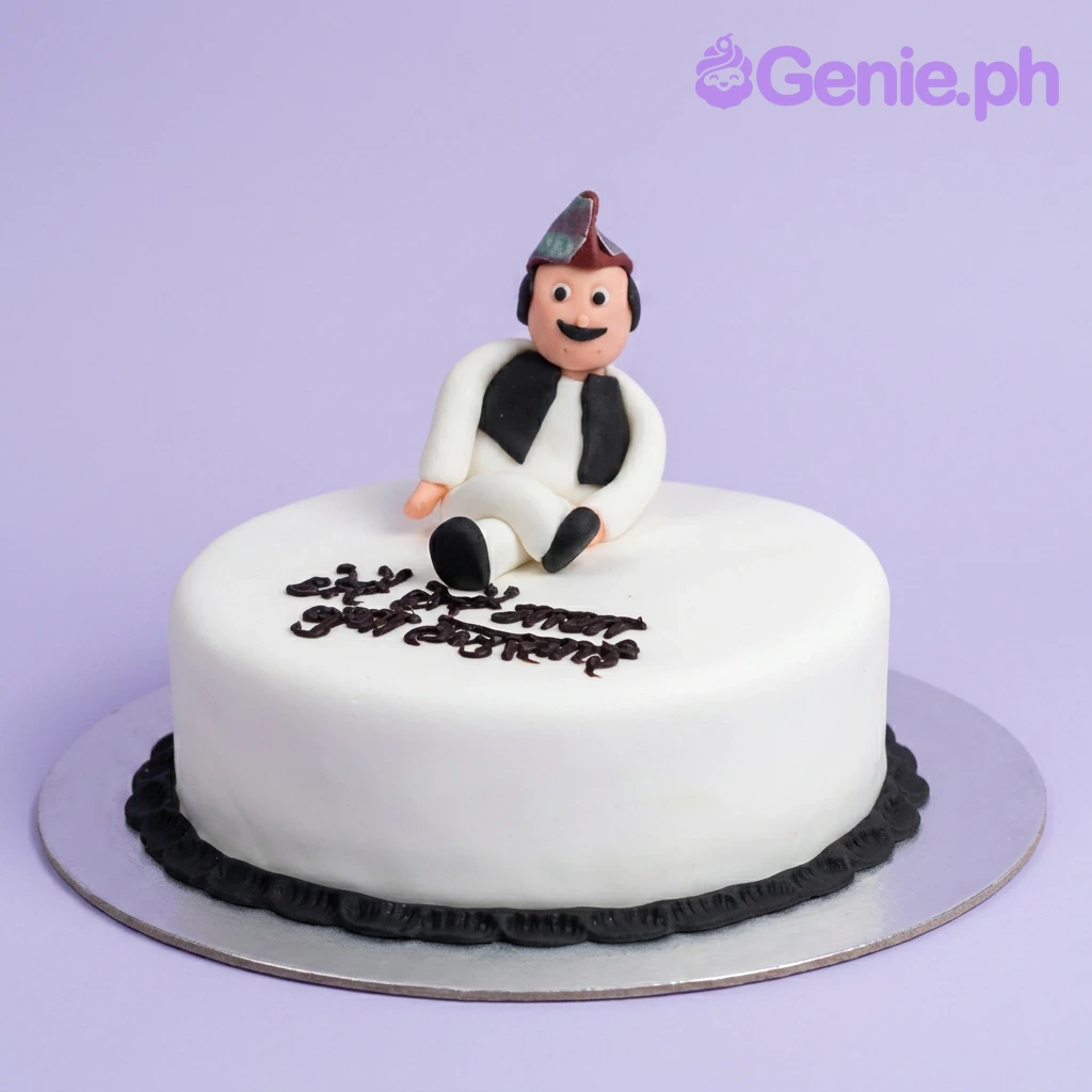 Traditional Man White Birthday Cake White fondant cake with a 3D edible figure of a man in traditional attire and black piped message.