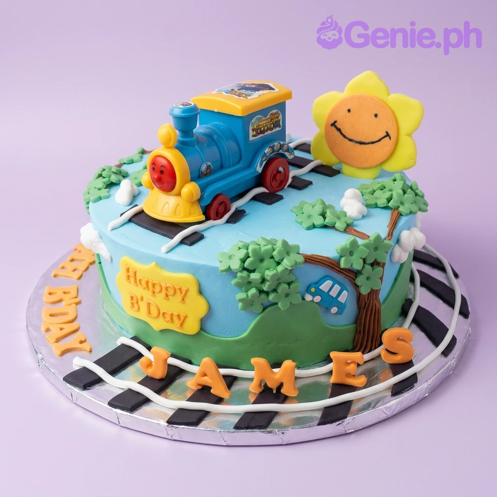 Train Sky Blue Birthday Cake Blue 1-tier train themed birthday cake with a toy train, fondant sun, trees, and a railway track on the base board.