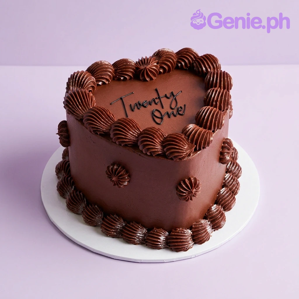 Twenty One Heart Maroon Birthday Cake A dark red 1-tier cake themed 'Twenty One Heart', featuring a 'Twenty One' text topper, dark red piped borders, and black ribbons.