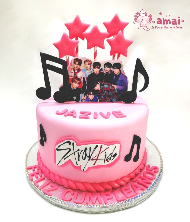Stray Kids Pink Glitter Cake Pink 1 tier fondant cake with Stray Kids group photo, pink glitter stars, black musical notes, and Stray Kids logo