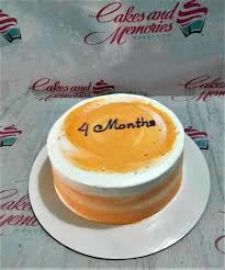 4 Months Orange Money Cake Design