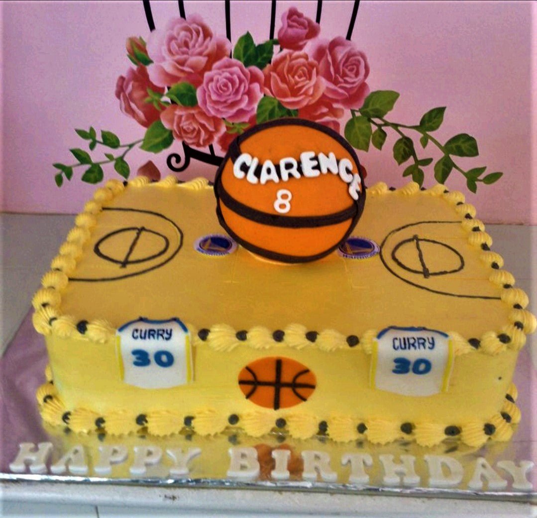 Yellow basketball court themed rectangle cake with a 3d basketball topper and Golden State Warriors jersey decorations. Yellow basketball court themed rectangle cake with a 3d basketball topper and Golden State Warriors jersey decorations.