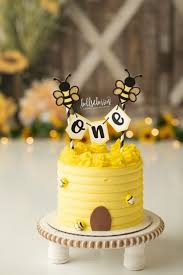 Bee One 1 Tier - brown, yellow theme with bee and ONE banner topper and small bee shapes Bee One 1 Tier - brown, yellow theme with bee and ONE banner topper and small bee shapes