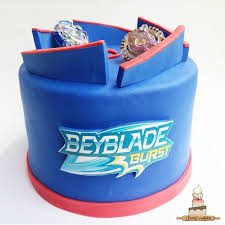Beyblade Burst 1 Tier Fondant - red theme with Beyblade tops and fondant arena walls Beyblade Burst 1 Tier Fondant - red theme with Beyblade tops and fondant arena walls