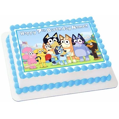 Rectangle Bluey themed birthday cake with light blue icing borders and a large edible printout of Bluey characters. Rectangle Bluey themed birthday cake with light blue icing borders and a large edible printout of Bluey characters.