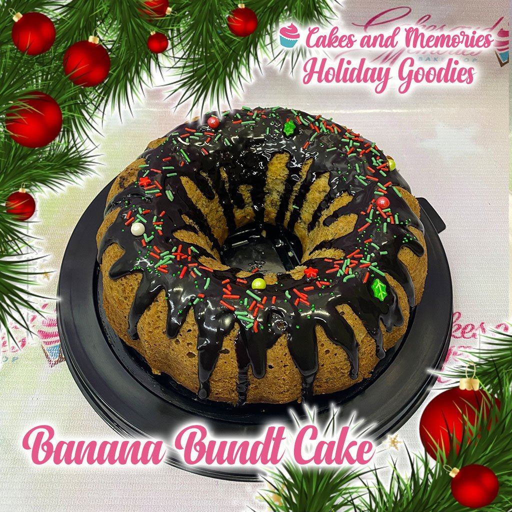 Banana Bundt Cake with dark chocolate drip and festive red and green Christmas sprinkles on a black plate. Banana Bundt Cake with dark chocolate drip and festive red and green Christmas sprinkles on a black plate.