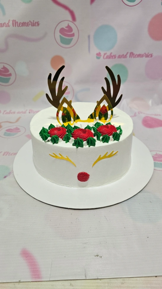 Christmas reindeer 1 Tier - red, rose, green theme with reindeer antlers and red icing roses Christmas reindeer 1 Tier - red, rose, green theme with reindeer antlers and red icing roses