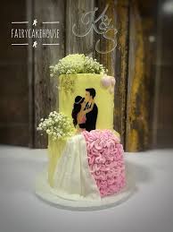 Couple Silhouette 2 Tier - white, pink theme with couple silhouette and white baby's breath Couple Silhouette 2 Tier - white, pink theme with couple silhouette and white baby's breath