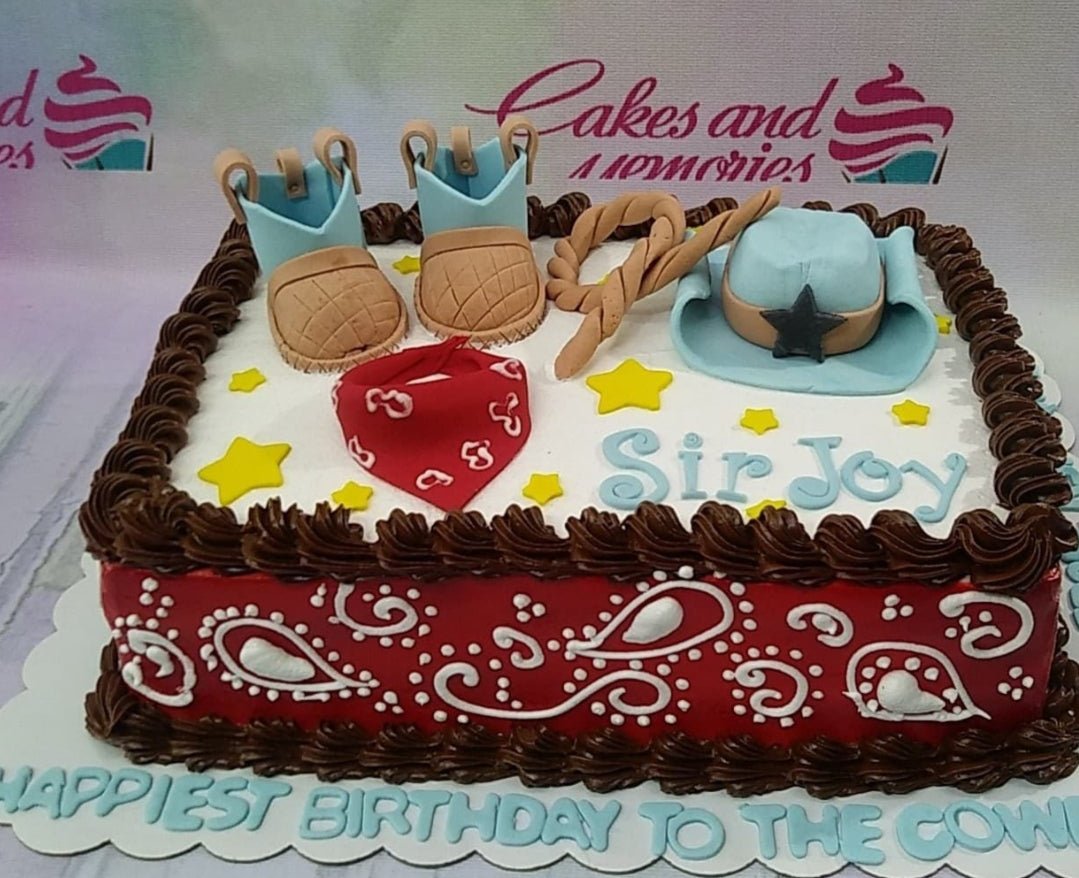 Western cowboy themed rectangle cake with red bandana pattern, fondant boots, hat, and rope toppers for Sir Joy's birthday. Western cowboy themed rectangle cake with red bandana pattern, fondant boots, hat, and rope toppers for Sir Joy's birthday.