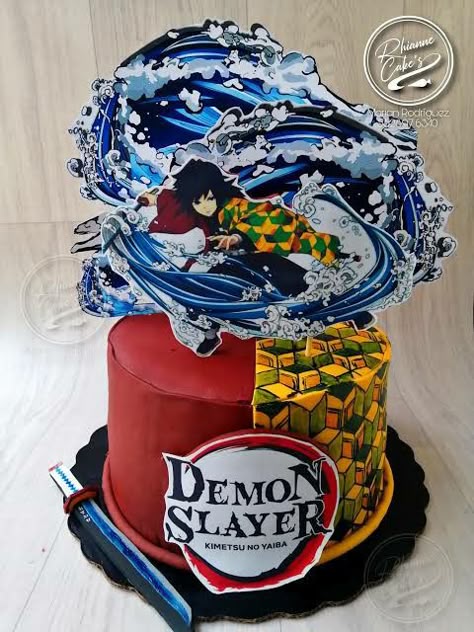A multicolor 1 Tier cake featuring a Giyu Tomioka character printout, Demon Slayer logo, katana sword, and a yellow and green geometric pattern panel. A multicolor 1 Tier cake featuring a Giyu Tomioka character printout, Demon Slayer logo, katana sword, and a yellow and green geometric pattern panel.