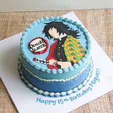 A light blue 1 tier cake featuring a Demon Slayer character illustration and blue and white icing decorations. A light blue 1 tier cake featuring a Demon Slayer character illustration and blue and white icing decorations.