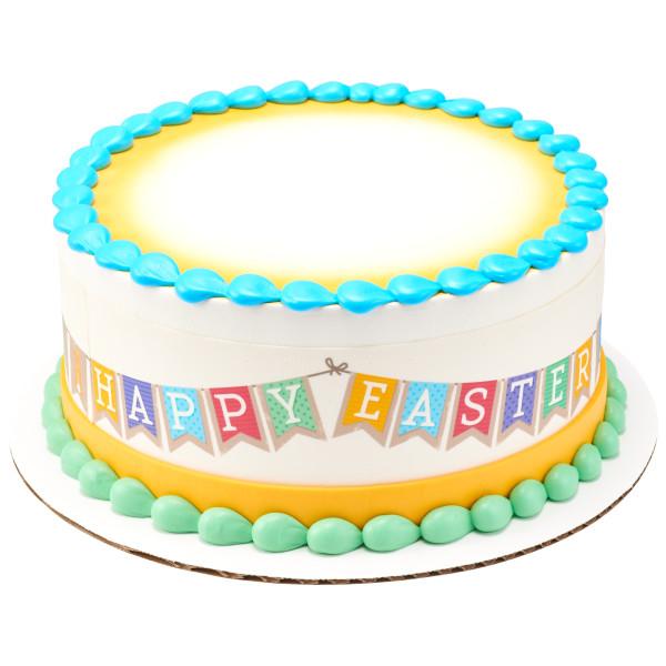 White round cake with yellow and blue icing borders and a colorful Happy Easter banner printout around the side. White round cake with yellow and blue icing borders and a colorful Happy Easter banner printout around the side.