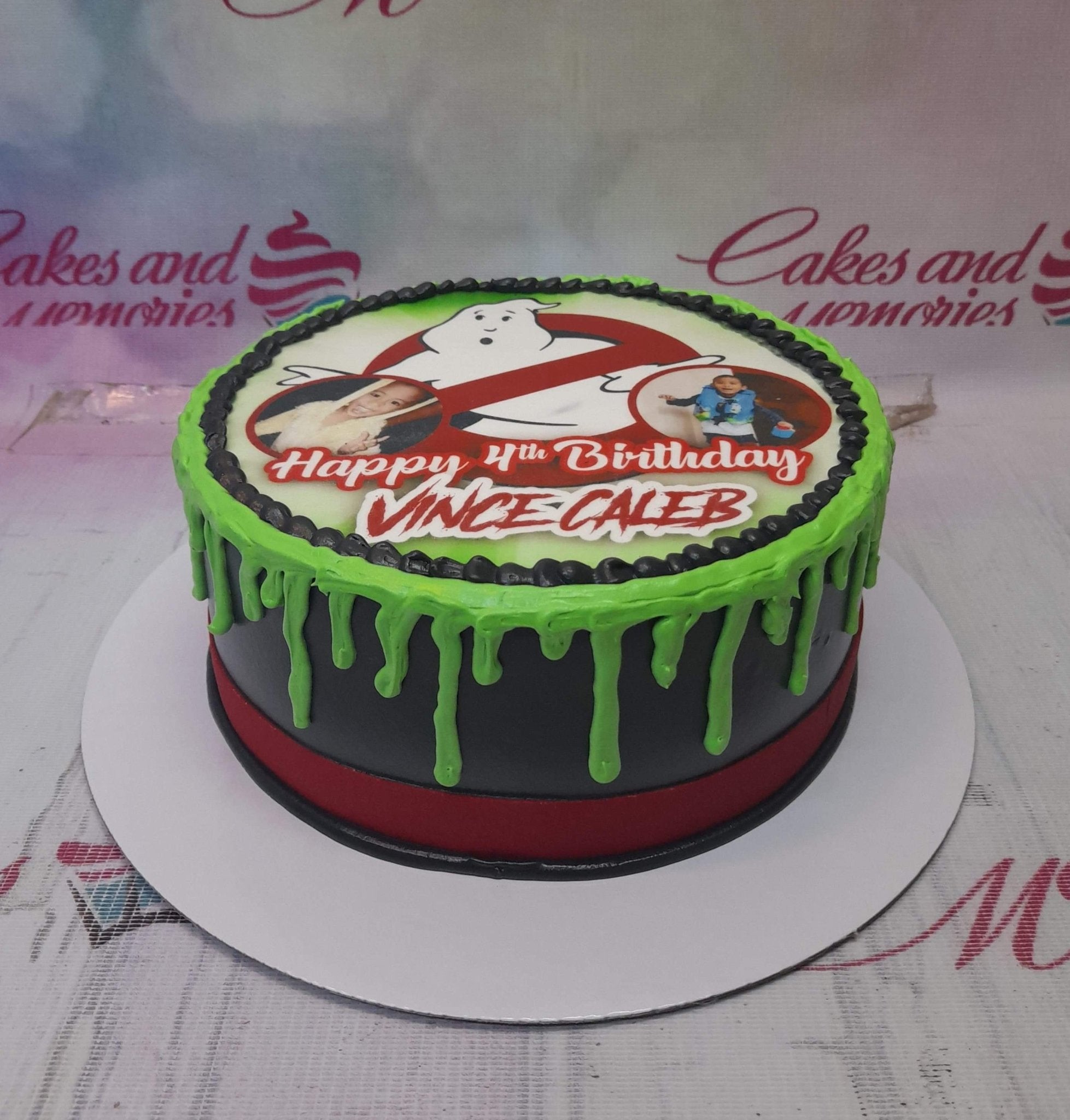 Ghostbusters themed birthday cake with black icing, green slime drip, and a custom edible photo topper for Vince Caleb's 4th birthday. Ghostbusters themed birthday cake with black icing, green slime drip, and a custom edible photo topper for Vince Caleb's 4th birthday.