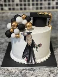 graduation 1 Tier - black, gold, white theme with graduation cap and black fondant balls graduation 1 Tier - black, gold, white theme with graduation cap and black fondant balls