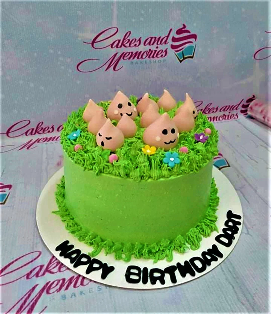 Grass Theme Darts Cake Design