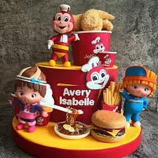 Two-tier Jollibee themed fondant cake with 3D character figures, chicken bucket, burger, fries, and spaghetti toppers. Two-tier Jollibee themed fondant cake with 3D character figures, chicken bucket, burger, fries, and spaghetti toppers.