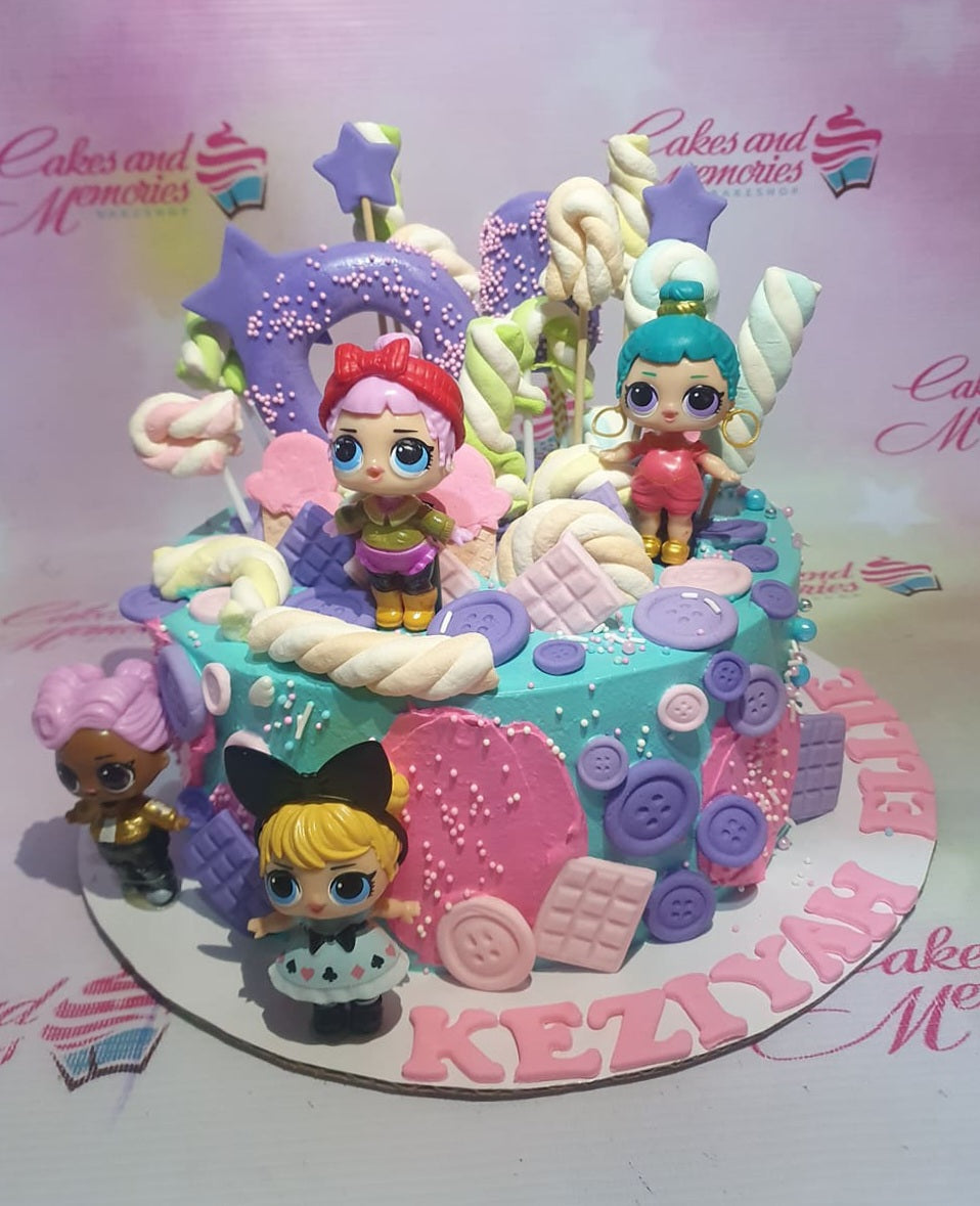 Teal LOL Surprise themed birthday cake with pink and purple fondant decorations, marshmallows, and character toys. Teal LOL Surprise themed birthday cake with pink and purple fondant decorations, marshmallows, and character toys.