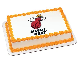 Rectangle white cake with orange shell borders and a Miami Heat logo printout in the center. Rectangle white cake with orange shell borders and a Miami Heat logo printout in the center.