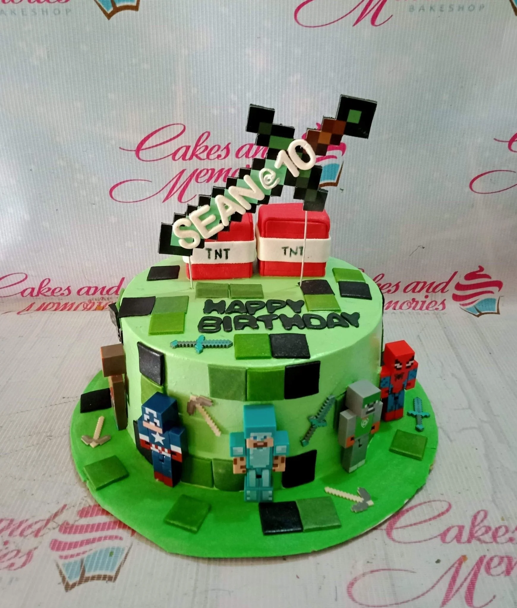 Minecraft-Inspired Mint Birthday Cake A green 1 Tier cake themed around Minecraft, featuring a pixel sword, pixelated characters, red TNT blocks, and pixel squares.