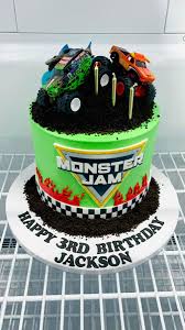 Monster Truck 1 Tier - blue, green, orange theme with green and blue monster truck and oreo crumbs Monster Truck 1 Tier - blue, green, orange theme with green and blue monster truck and oreo crumbs