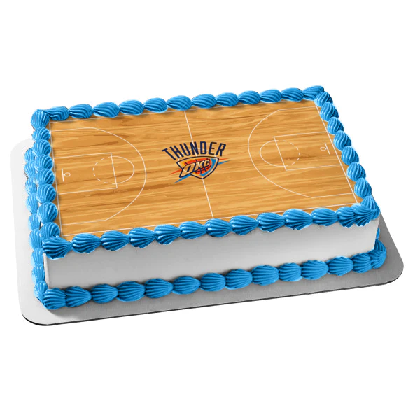 Oklahoma City Thunder basketball court rectangle cake with blue icing borders and a printed court design on top. Oklahoma City Thunder basketball court rectangle cake with blue icing borders and a printed court design on top.