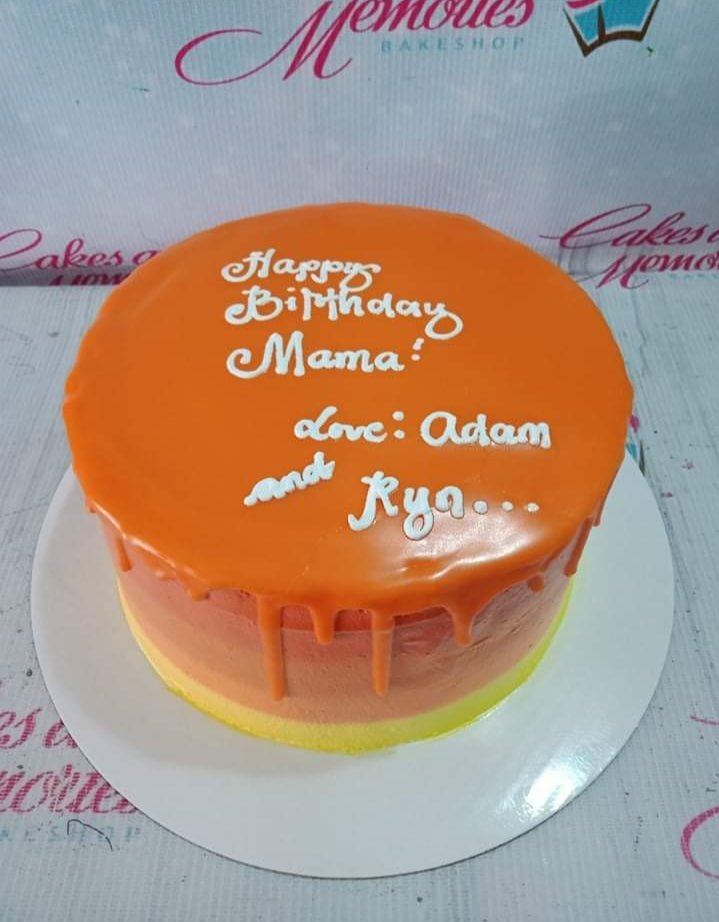 Single tier birthday cake with orange, peach, and yellow gradient icing, orange drip, and white piped message for Mama. Single tier birthday cake with orange, peach, and yellow gradient icing, orange drip, and white piped message for Mama.