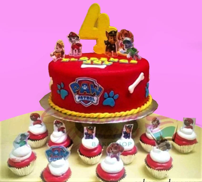 Paw Patrol-Inspired Cake A red, yellow, blue, and white 1 Tier Fondant cake themed around Paw Patrol, featuring a large yellow number 4 topper, character cutouts, and personalized text.
