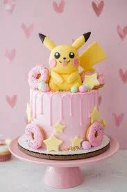 A pink 1 Tier cake featuring a Pikachu figure, pink donuts, yellow stars, and pastel fondant balls.