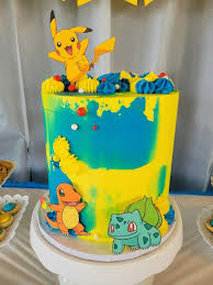 Pokemon 1 Tier - blue, yellow, red theme with Pikachu and blue and yellow icing dollops