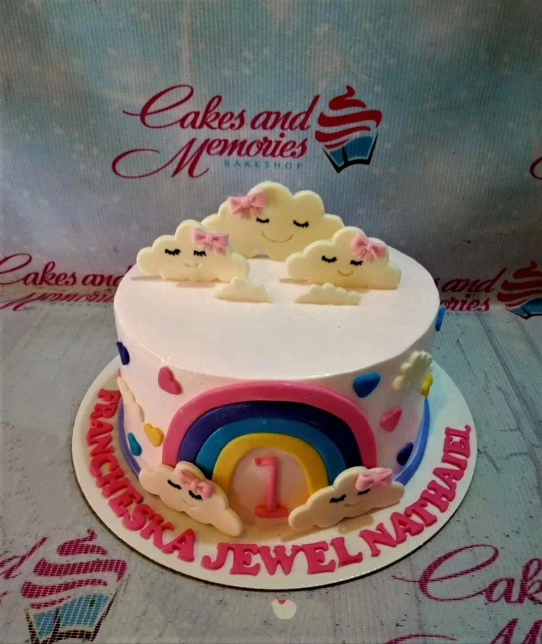 Rainbow Cloud Raindeer Cake Design