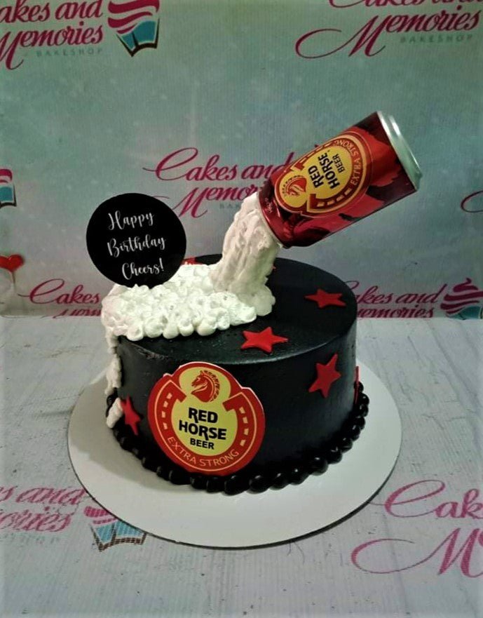 Black Red Horse Beer themed cake with a pouring beer can topper and white icing foam. Black Red Horse Beer themed cake with a pouring beer can topper and white icing foam.