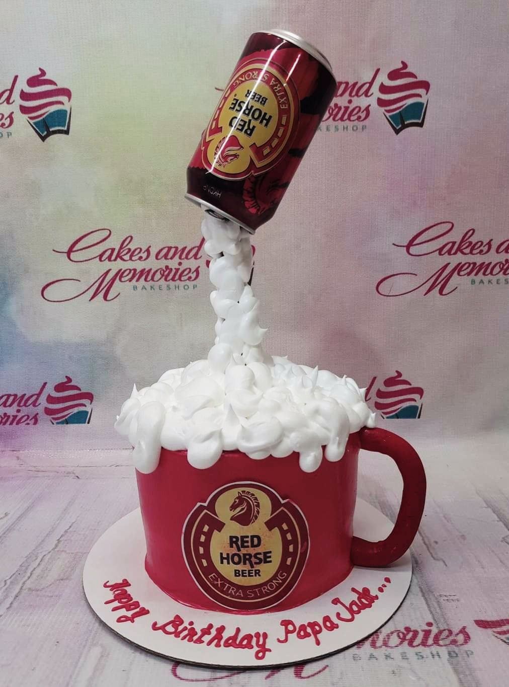 Red Horse beer mug cake with a pouring beer can effect and white icing foam Red Horse beer mug cake with a pouring beer can effect and white icing foam