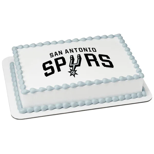 San Antonio Spurs White Rectangle Cake A white rectangular San Antonio Spurs basketball cake with a printed team logo and light blue piped icing borders.