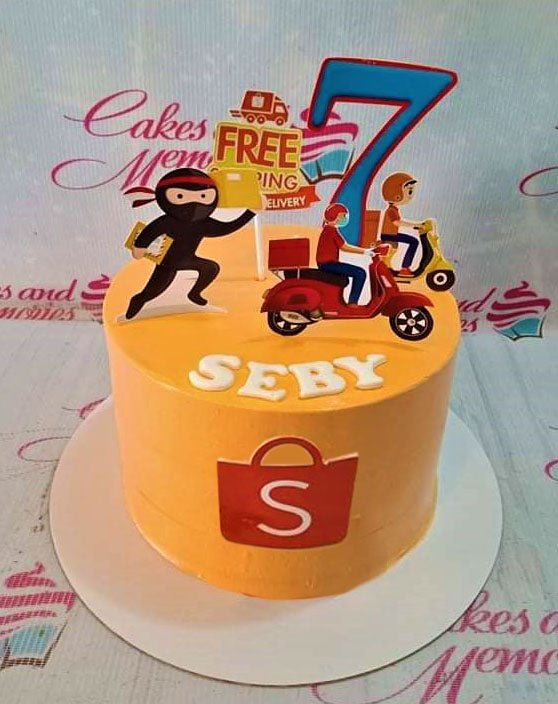 Orange Shopee themed birthday cake for Seby with delivery rider and ninja printout toppers. Orange Shopee themed birthday cake for Seby with delivery rider and ninja printout toppers.
