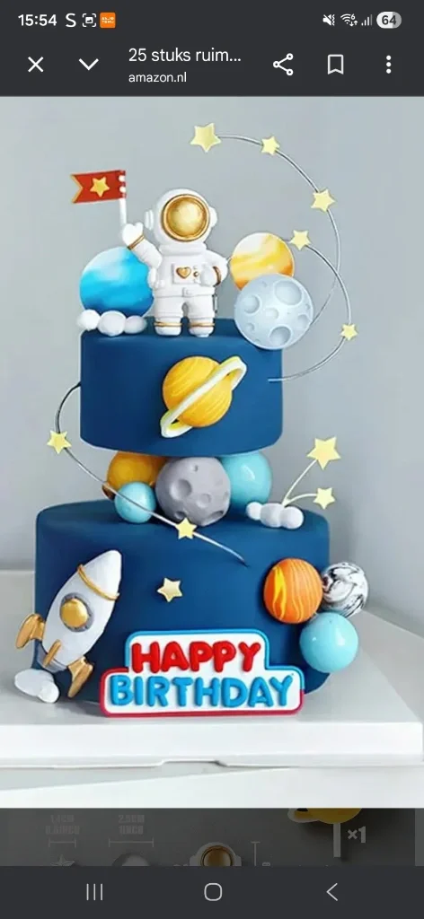 Two-tier navy blue fondant space themed cake with an astronaut, planets, and a rocket ship. Two-tier navy blue fondant space themed cake with an astronaut, planets, and a rocket ship.