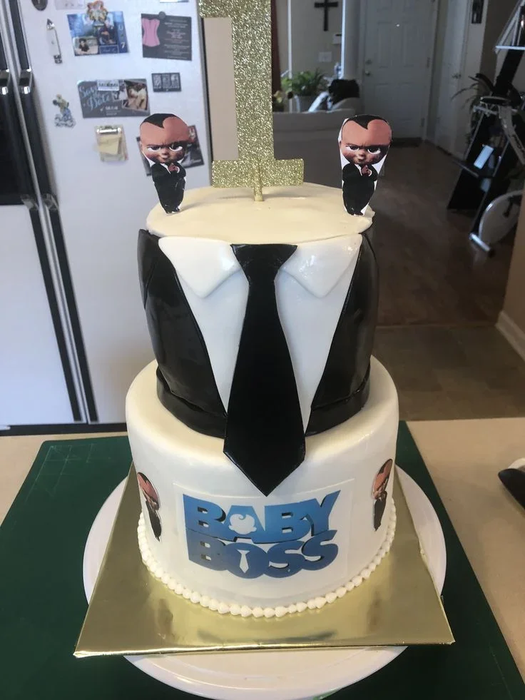 Boss Baby-Inspired Glitter 2-Tier Birthday Cake 2-tier white fondant cake with suit design and Boss Baby character printouts