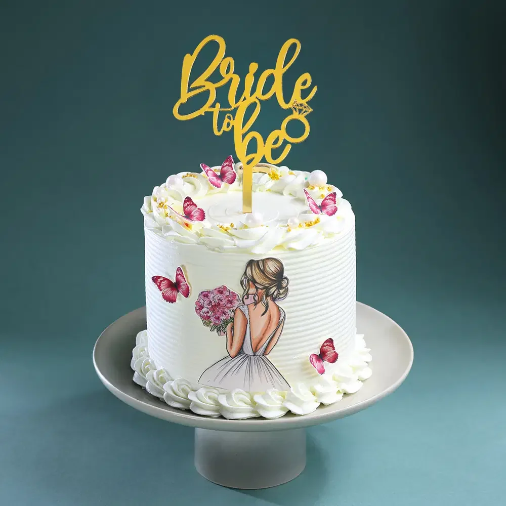 Bridal Shower White Cake White 1-tier bridal shower cake with bride printout and gold Bride to be topper