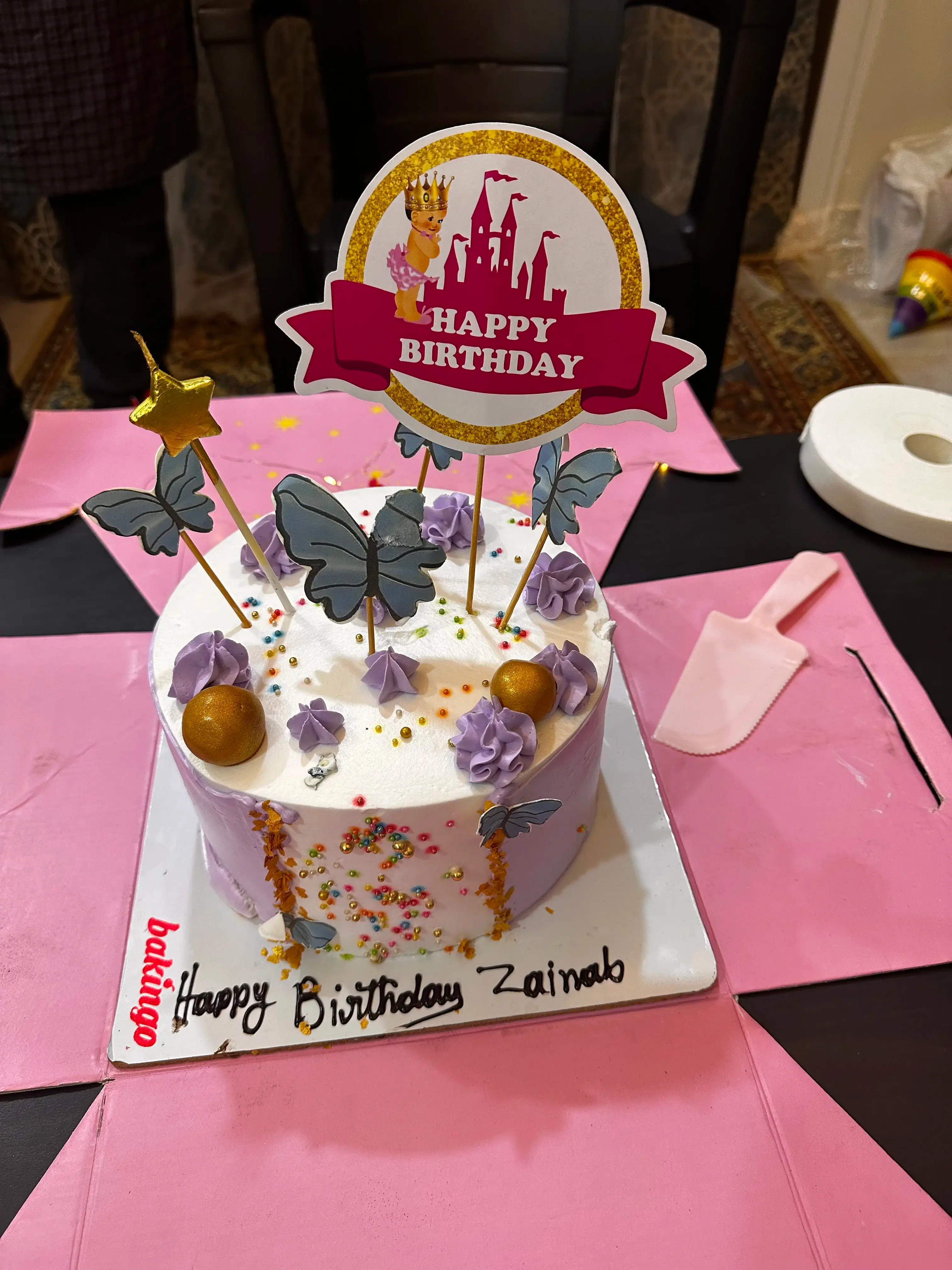 Butterfly Birthday White Cake Lavender and white birthday cake with butterfly and Happy Birthday printout toppers