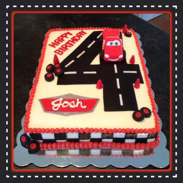 Rectangle Cars themed birthday cake for Josh's 4th birthday featuring Lightning McQueen on a road shaped like the number 4. Rectangle Cars themed birthday cake for Josh's 4th birthday featuring Lightning McQueen on a road shaped like the number 4.