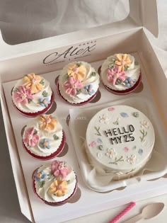 Floral Bento Cupcake Set White Birthday Cupcakes White bento and five cupcakes in a gift box decorated with colorful edible flower clusters and black piped message