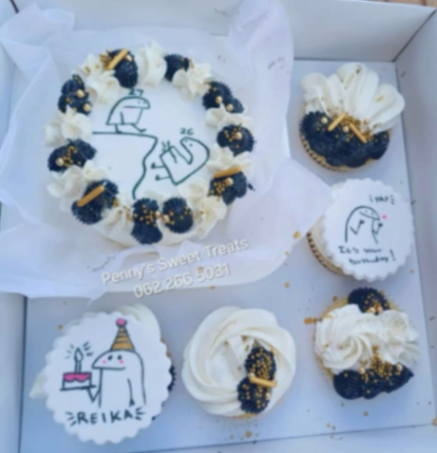 Memes Bento Cupcake Set Cupcakes White bento and cupcakes with black and white character printouts, piped rosettes, and gold sprinkles
