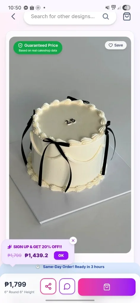 Elegant white minimalist cake with black satin bows and piped icing borders featuring the number 25 on top.