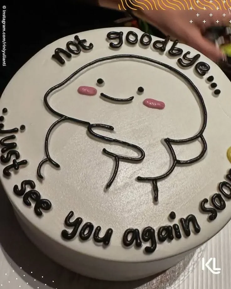 White minimalist bento-style cake with a hand-drawn black icing doodle of a blushing character and a heartfelt message. White minimalist bento-style cake with a hand-drawn black icing doodle of a blushing character and a heartfelt message.