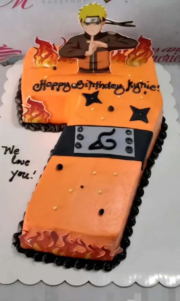 Orange number 7 shaped Naruto themed birthday cake with black icing borders and character printouts. Orange number 7 shaped Naruto themed birthday cake with black icing borders and character printouts.