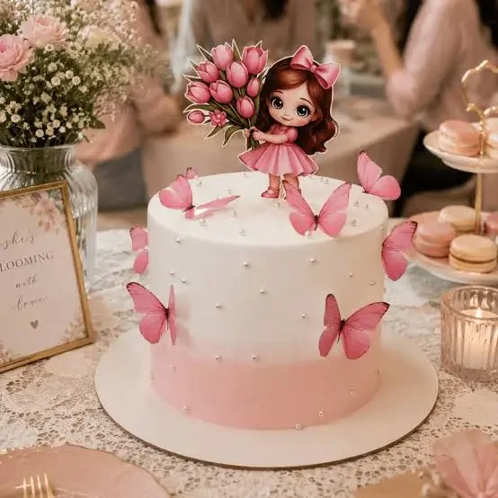 Pink Butterfly White Cake Pink and white 1-tier gradient cake with soft icing, cartoon girl topper, and scattered pink butterflies