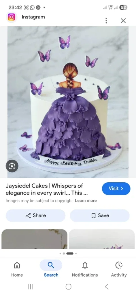 White single tier cake featuring a girl in a purple gumpaste ballgown with purple butterfly toppers.