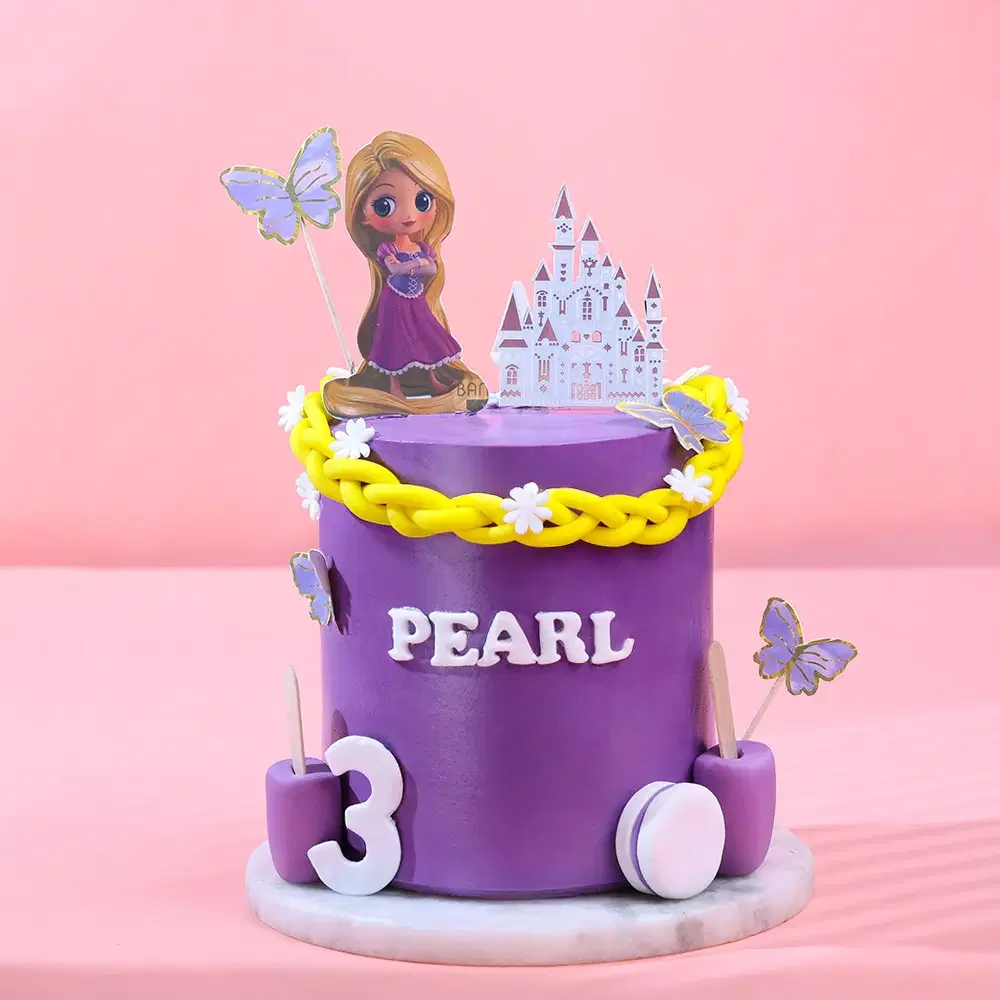 Rapunzel-Inspired Birthday Purple Cake Purple 1-tier birthday cake with Rapunzel and castle printout toppers and fondant braid